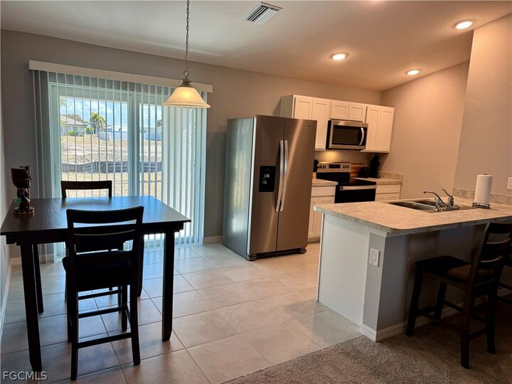 Property Photo:  3003 NW 6th Place  FL 33993 