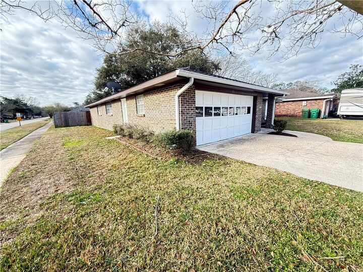 Property Photo:  201 Darwin Drive  LA 70458 