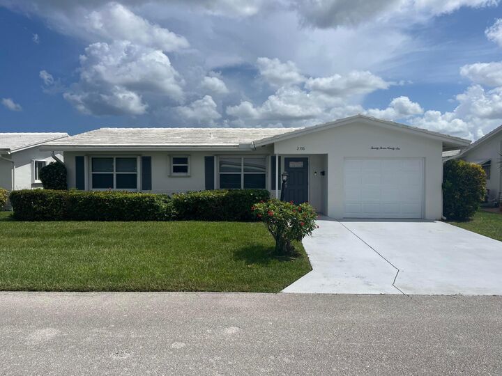 Property Photo:  2396 SW 13th Avenue  FL 33426 