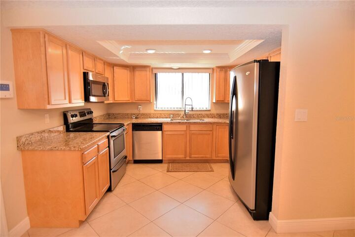 Property Photo:  9310 Mark Twain Lane  FL 34668 