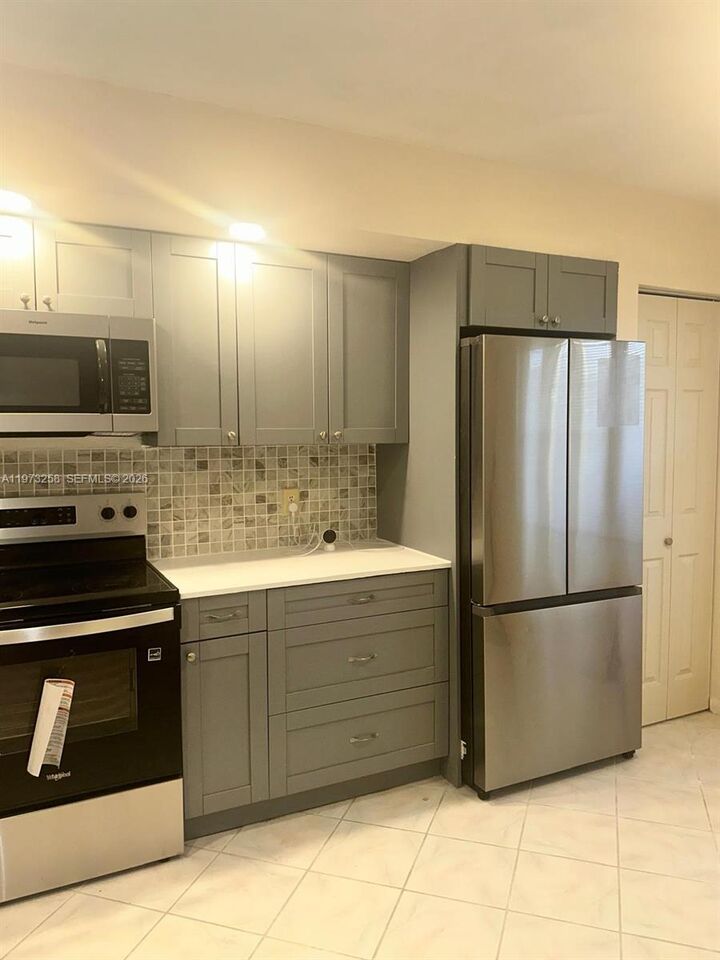 Property Photo:  12800 SW 7th Ct 306G  FL 33027 