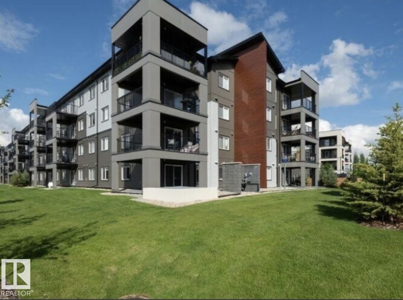 Property Photo: 394 Windermere Boulevard NW 210 AB T6W 0R1