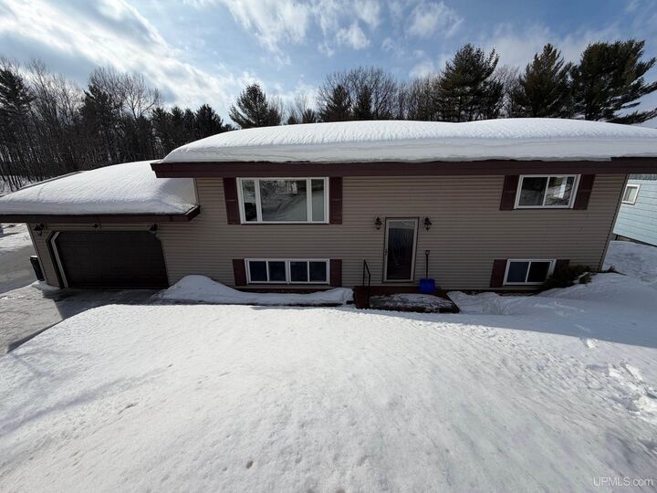 Property Photo:  108 Woodland Drive  MI 49866-1510 