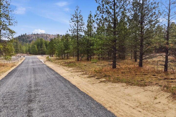 Property Photo:  65xx Whispering Pines Way Lot #3  WA 99026 