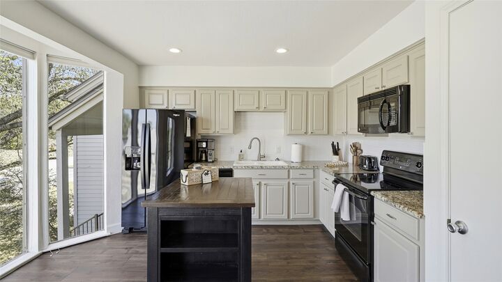 Property Photo:  133 World Of Tennis Square  TX 78738 