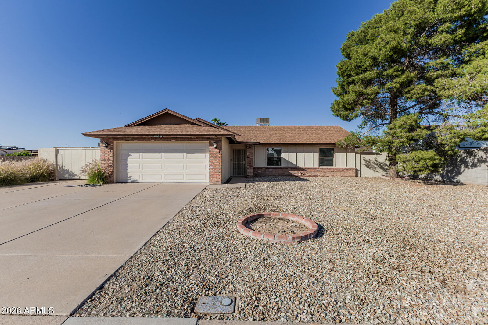 Property Photo:  6850 W Cholla Street  AZ 85345 