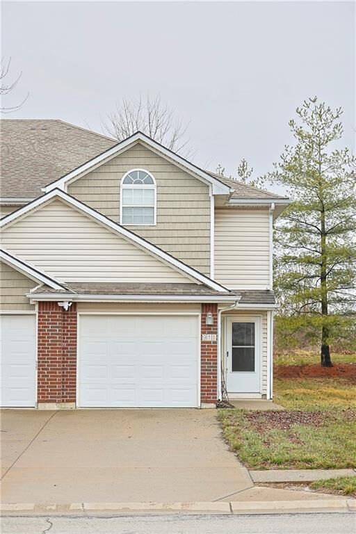 Property Photo:  911 SW Peach Tree Lane  MO 64064 