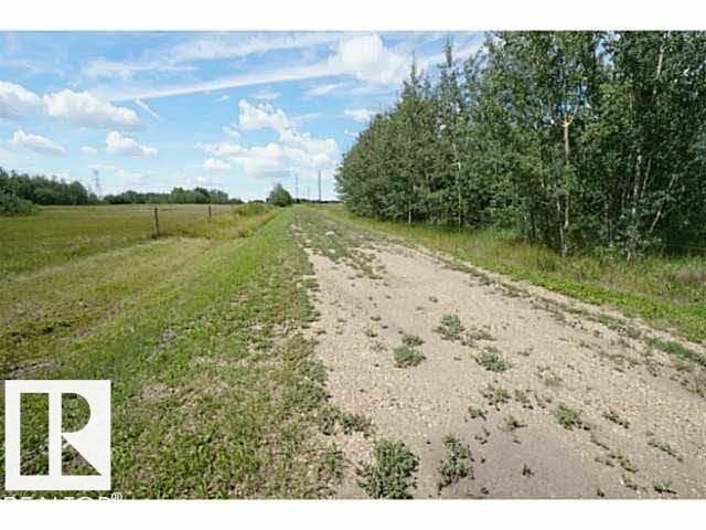 Property Photo: 23650 18 Street NW AB T5B 2K3