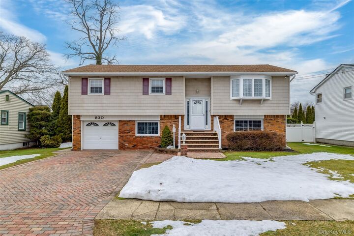 Property Photo:  830 N Broome Avenue  NY 11757 