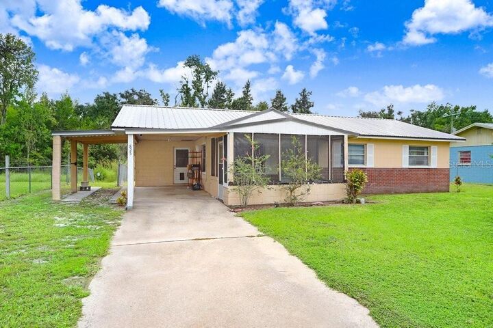 Property Photo: 825 Chamberlain Boulevard FL 33873