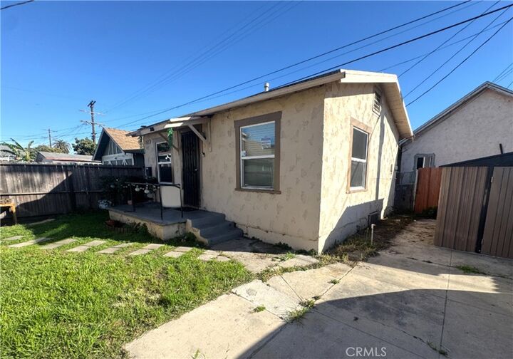 Property Photo:  150 E 70th Street 1,2  CA 90003 