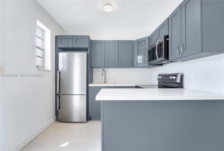 Property Photo:  15991 NE 18th Pl 3  FL 33162 