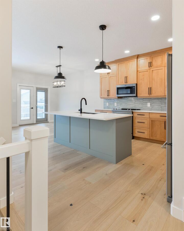 Property Photo: 1005 Calahoo Road 23 AB T7X 2T7