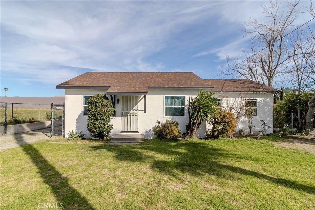 Property Photo: 9023 Olive CA 92335