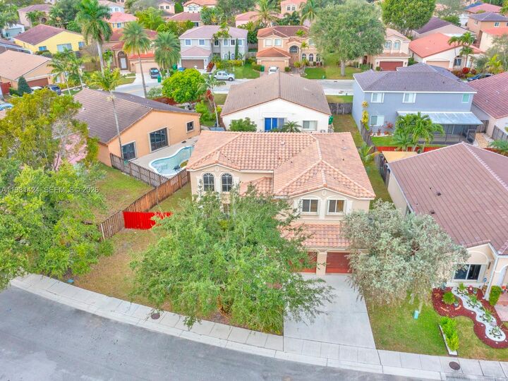 Property Photo:  1663 E Harmony Lake Cir .  FL 33324 