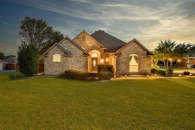 Property Photo:  202 Tee Taw  TX 75092 