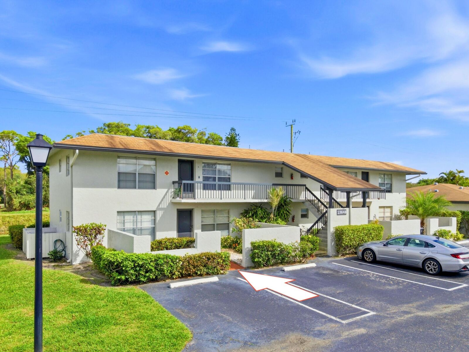 Property Photo:  13648 Coconut Palm Court A  FL 33484 