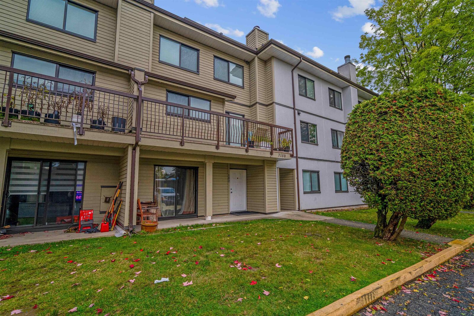 Property Photo: 7150 133 Street 102 BC V3W 7Z7
