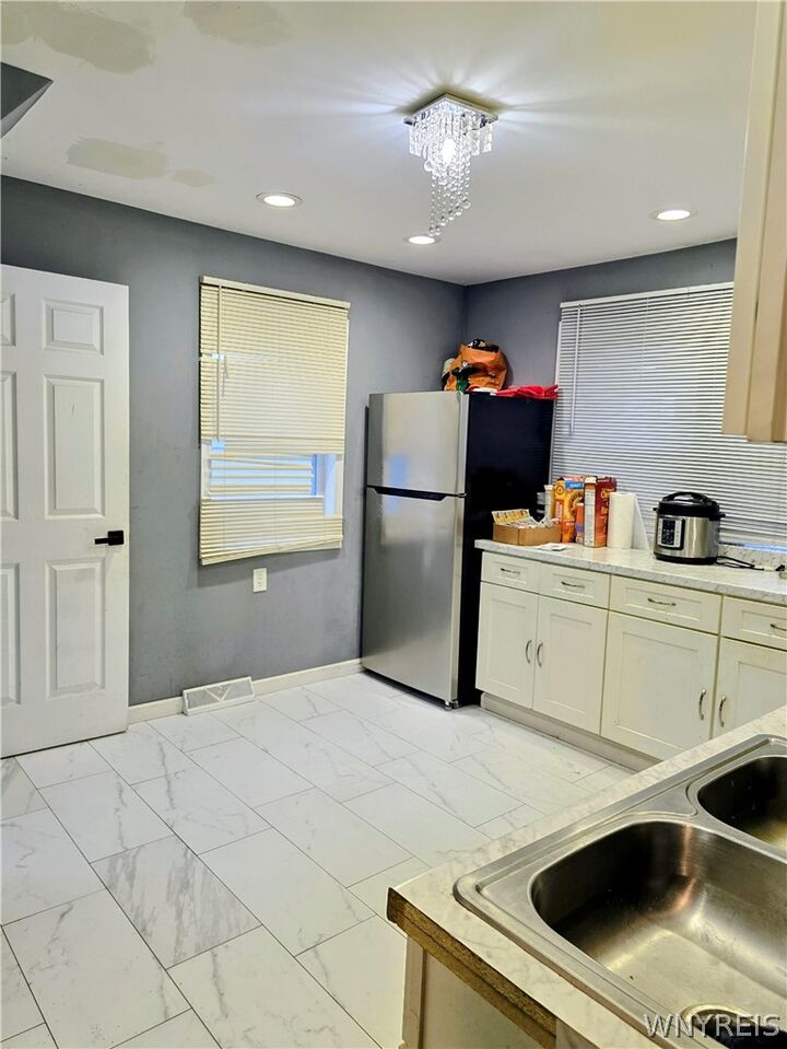 Property Photo:  30 Jackson Avenue  NY 14218 