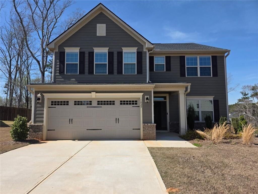Property Photo:  1029 Climbing Rose Way  GA 30253 