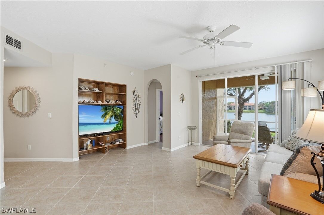 Property Photo:  6560 Huntington Lakes Circle 104  FL 34119 