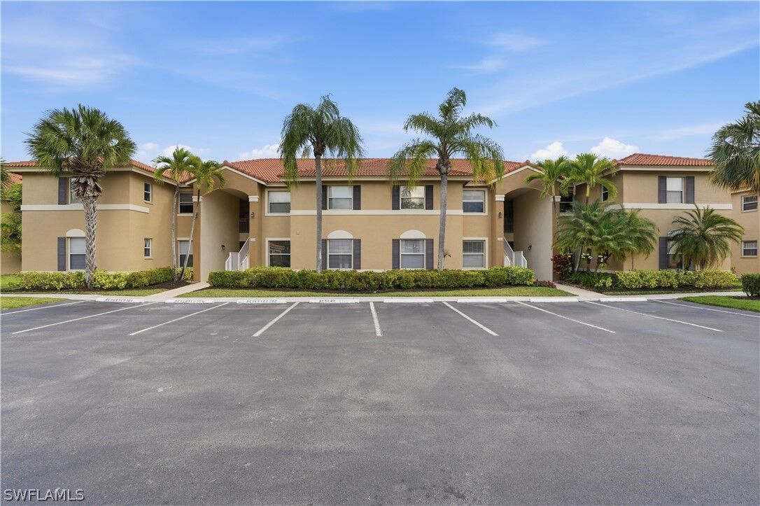 Property Photo: 6560 Huntington Lakes Circle 104 FL 34119