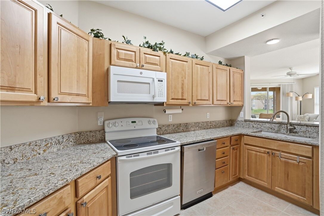 Property Photo: 6560 Huntington Lakes Circle 104 FL 34119