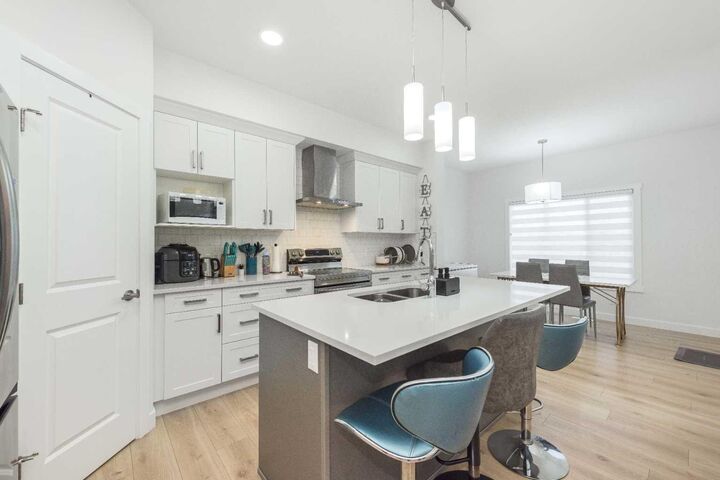 Property Photo: 308 Sora Terrace SE AB T3S 0L8