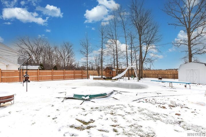 Property Photo:  202 Woodstream Drive  NY 14072 