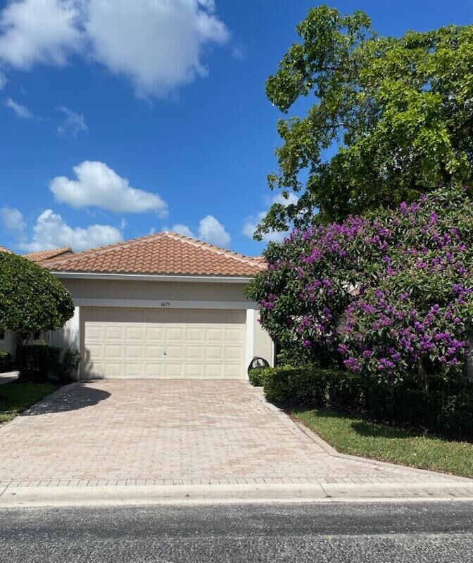 Property Photo: 6675 NW 25th Way FL 33496