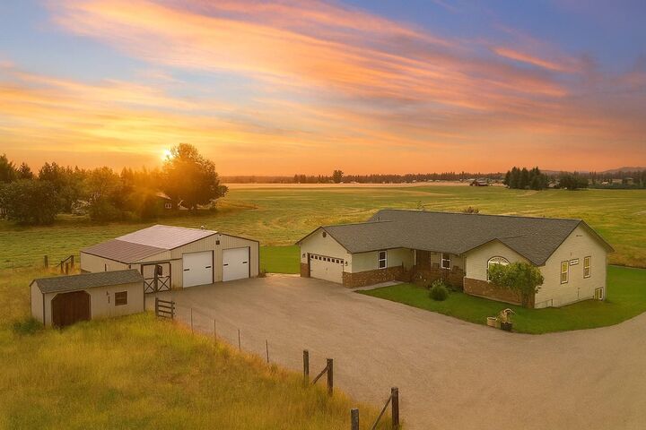 Property Photo:  8715 W Antler Rd  WA 99006 