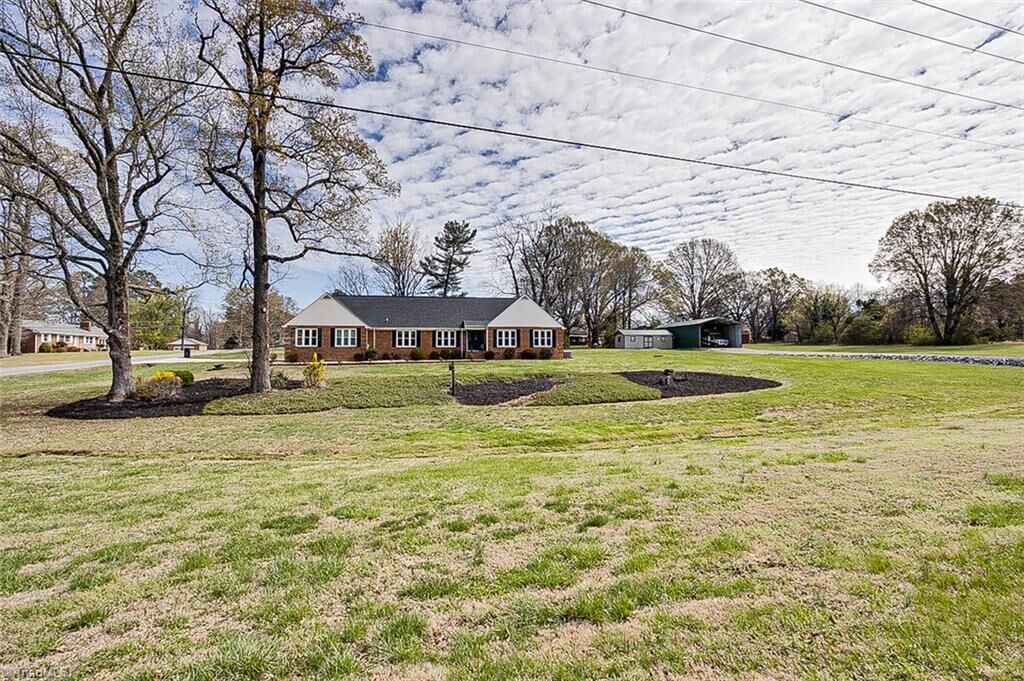 Property Photo:  4701 Liberty Road  NC 27406 