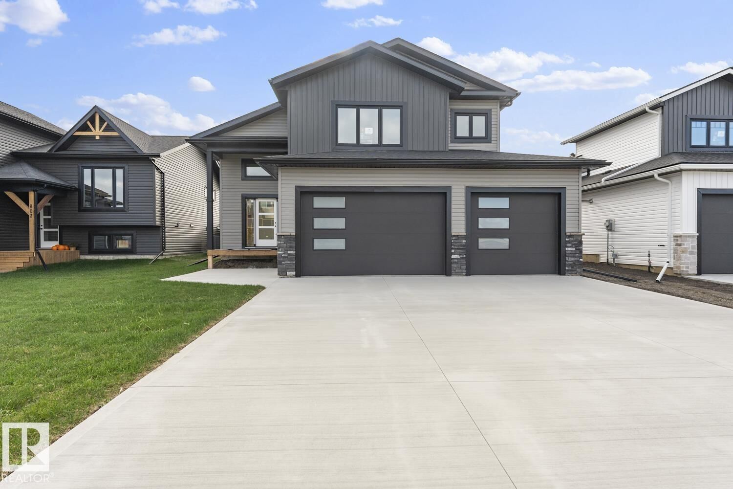 Property Photo: 1410 Wildrye Crescent AB T9M 0K6