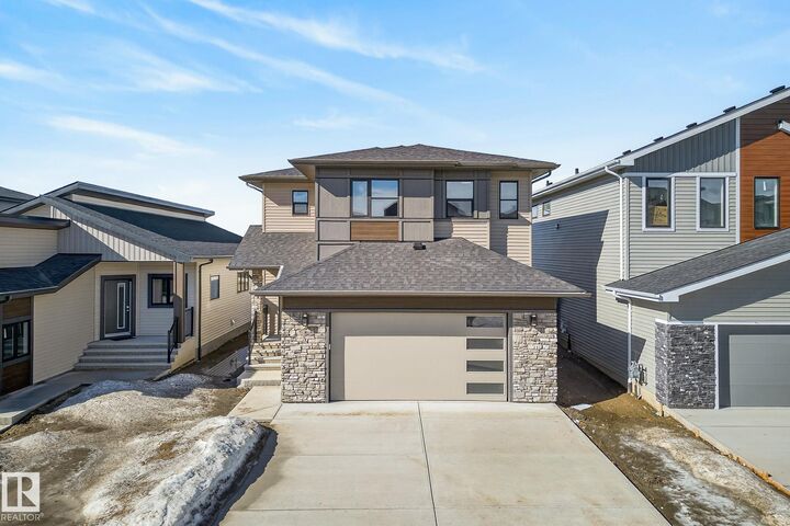 Property Photo: 7091 Kiviaq Crescent SW AB T6W 5N7