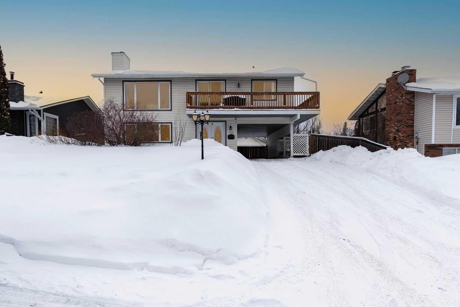 Property Photo:  713 Timberline Drive  AB T9K 1B1 