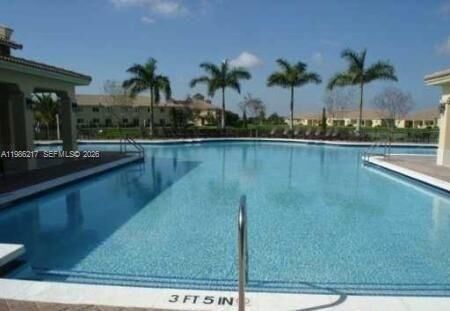 Property Photo:  940 NE 33 Ter 101  FL 33033 