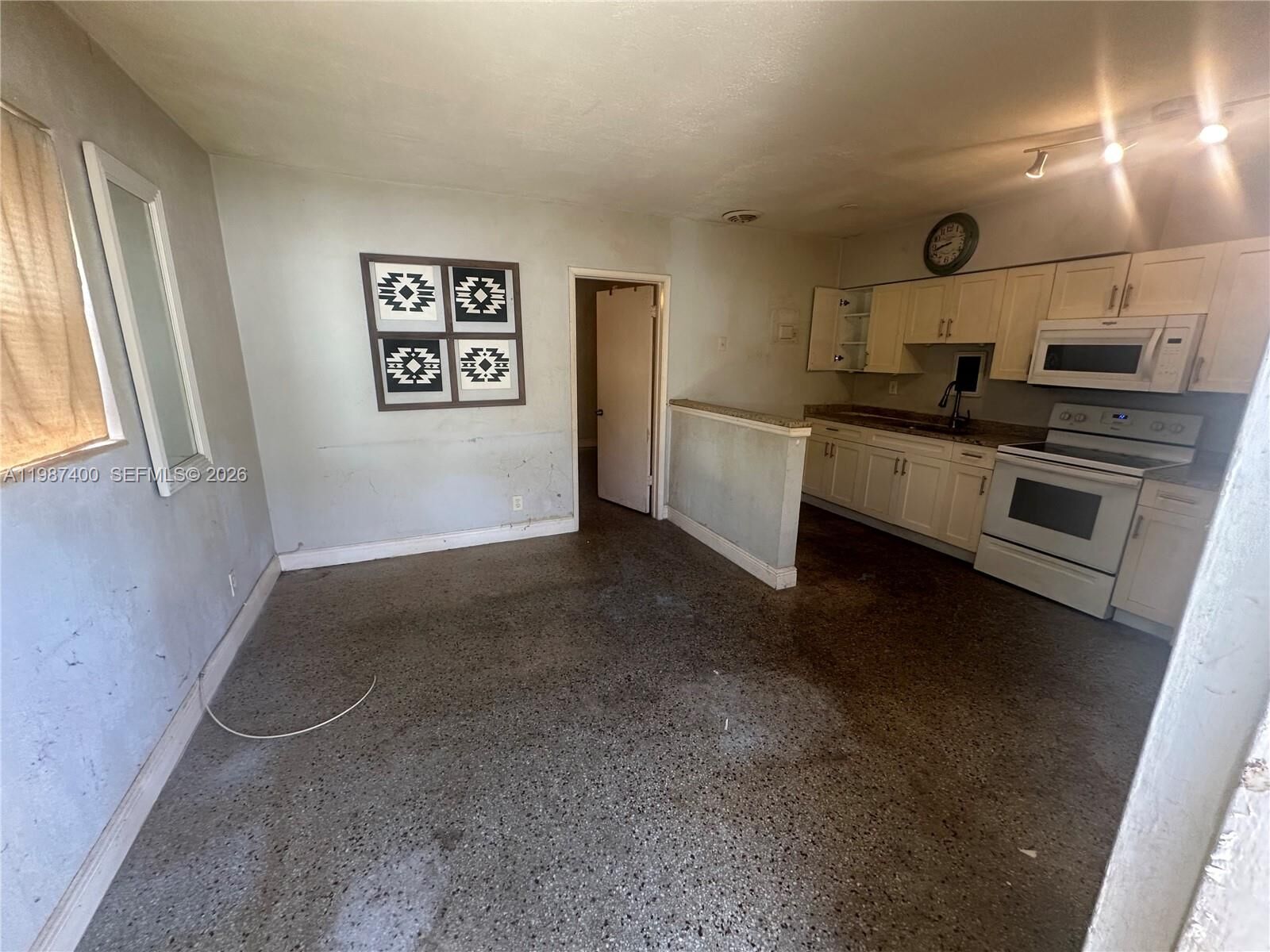 Property Photo:  1271 NE 32nd St A  FL 33334 