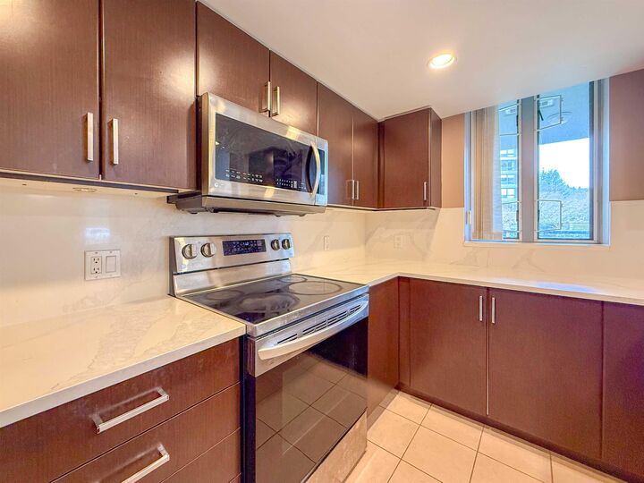 Property Photo: 295 Guildford Way 201 BC V3H 5N3