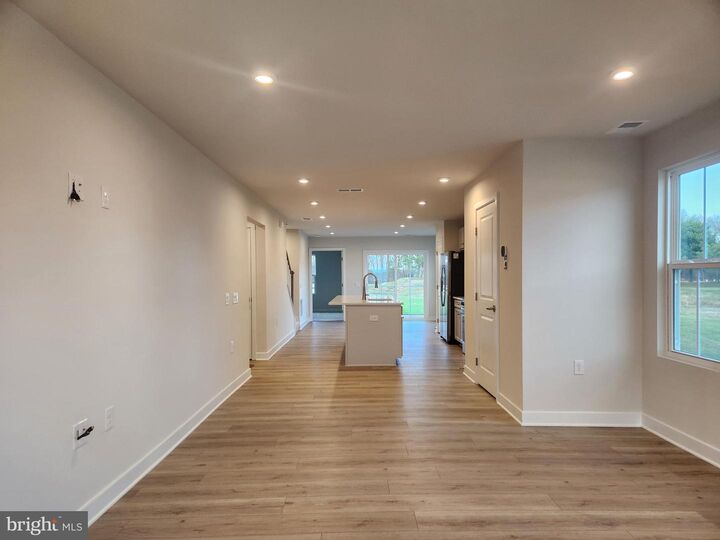 Property Photo:  377 Waterside Square  DE 19933 