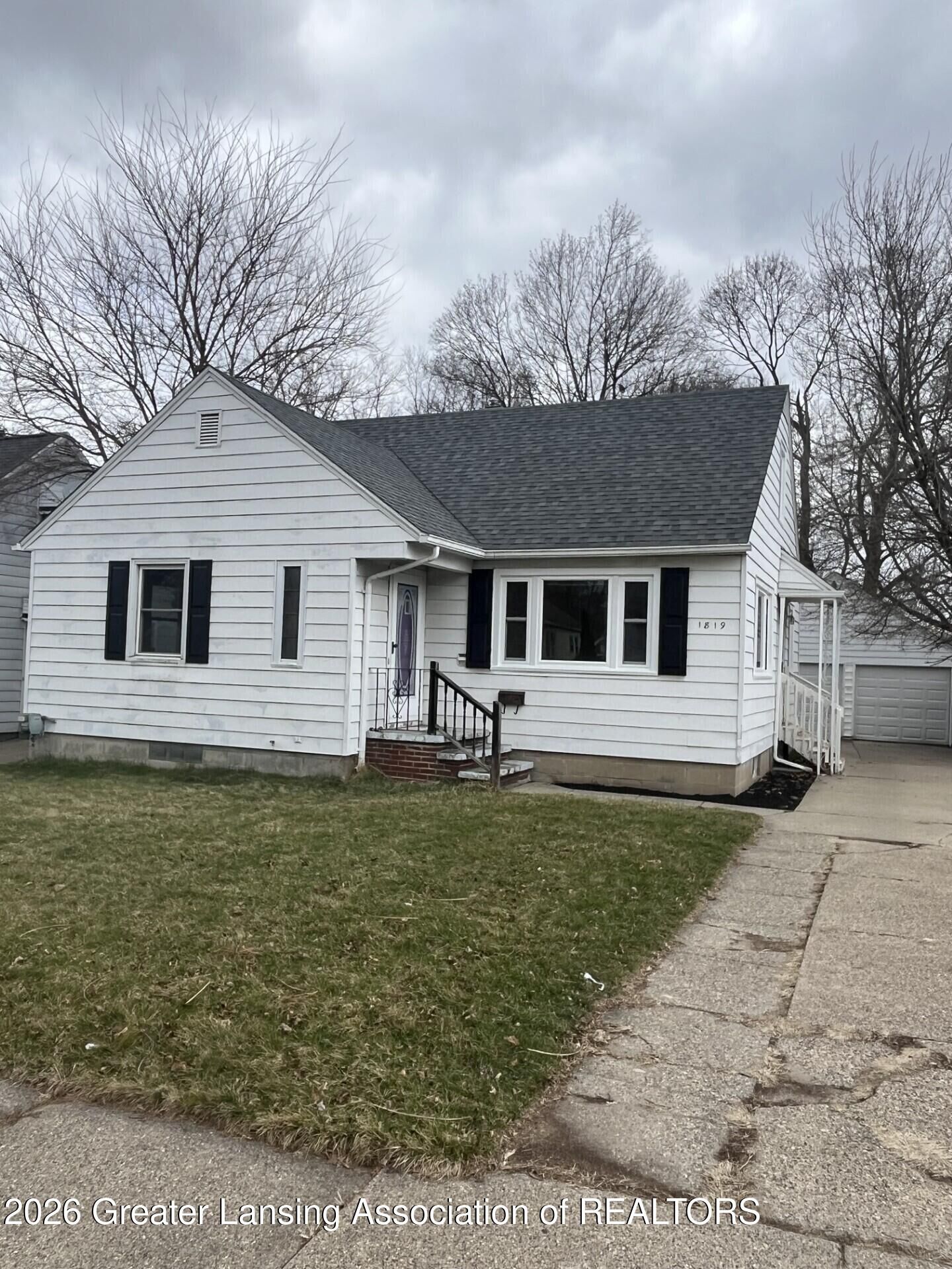 Property Photo:  1819 Alpha Street  MI 48910 