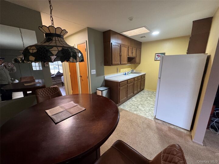 Property Photo:  120 Exmore Court A  NY 11961 