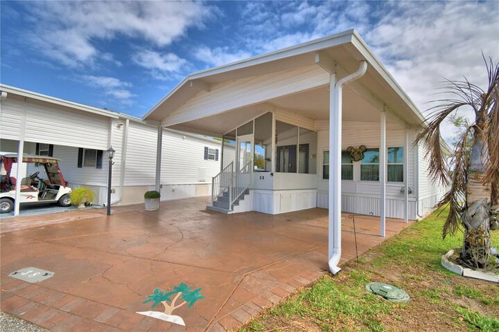 Property Photo:  9000 US Highway 192 38  FL 34714 