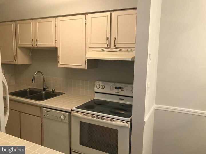 Property Photo:  5911 Prince James Drive E 25  VA 22152 