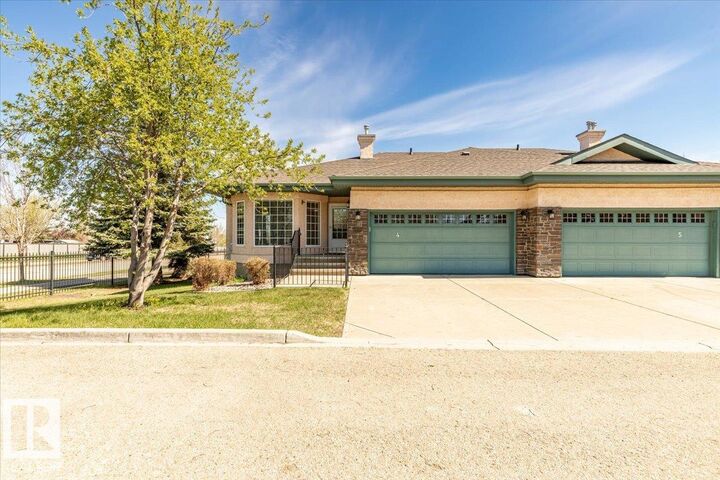 Property Photo: 102 Bridgeport Crossing 4 AB T9E 8K8