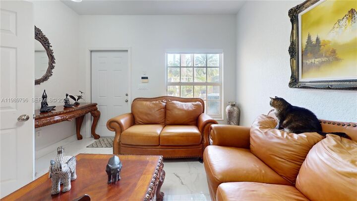 Property Photo:  809 NW 170th Ter 26  FL 33028 