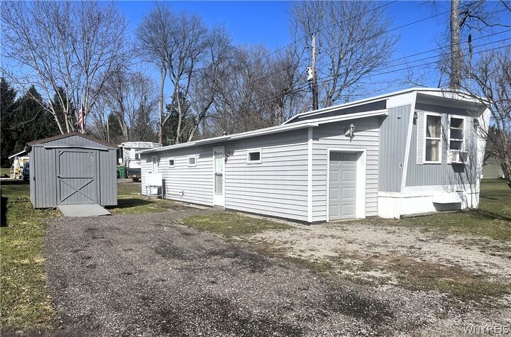 Property Photo:  7207 Hunters Creek #4 Road 4  NY 14080 