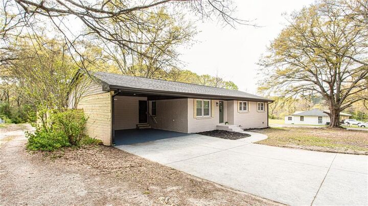 Property Photo:  1318 Needmore Street SW  GA 30012 