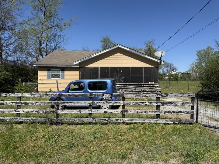 Property Photo:  303 Cainsville Rd  TN 37087 