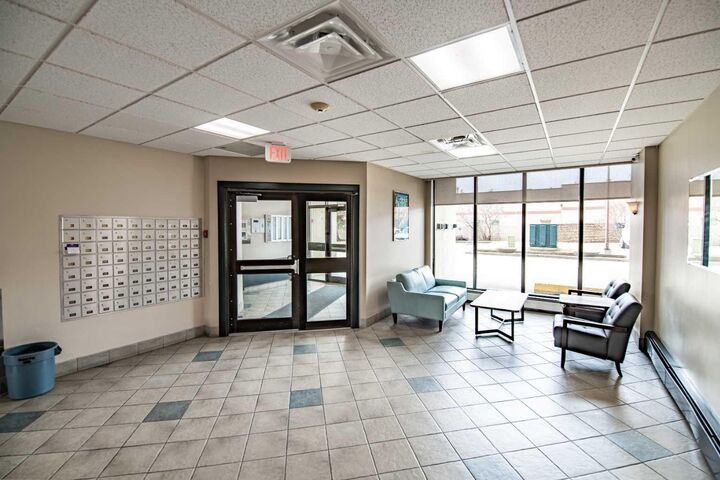 Property Photo:  4902 37 Street 1505  AB T4N 6M9 