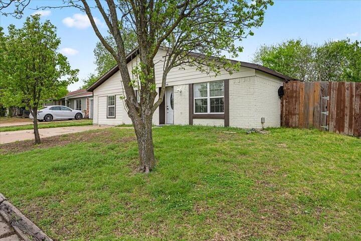 Property Photo:  1306 Eagle Pass  TX 75040 